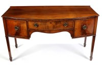 Lot 1267 - A mahogany bowfront kneehole dressing table,...