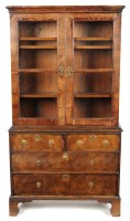 Lot 1270 - A walnut cabinet-on-chest, with flared cornice...