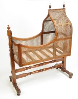 Lot 1286 - A Victorian mahogany bergere cradle, the...