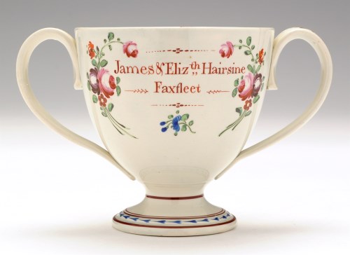 Lot 65 - Pearlware two-handled cup, enamel painted with...
