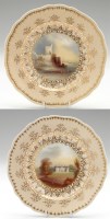Lot 94 - Pair of bone china plates, painted with scenes...