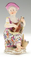 Lot 153 - Meissen figure of girl playing a lute, seated...