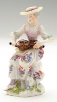 Lot 154 - Meissen figure of a columbine playing the...