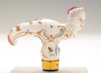 Lot 164 - German porcelain cane handle, with Frauenkopf...