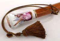 Lot 168 - German porcelain cane handle, painted with...