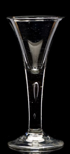 Lot 186 - Wine glass, with drawn trumpet bowl and tiered...