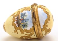 Lot 234 - English enamel egg-shaped bonbonniere, yellow...