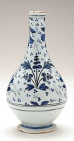 Lot 276 - Delftware bottle vases, painted with sparse...