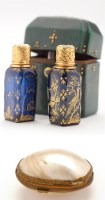 Lot 444 - Two miniature blue glass scent bottles in...