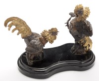 Lot 474 - A pair of bronze fighting cocks, each with...