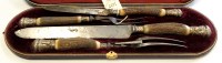 Lot 544 - A Victorian meat and game carving set, by...