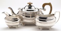 Lot 555 - A George VI three-piece tea service, by...