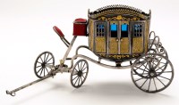 Lot 577 - An Elizabeth II silver model of a carriage, by...