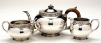 Lot 590 - A George V three-piece tea service, London...