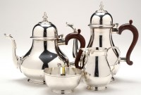 Lot 592 - An Elizabeth II four-piece tea and coffee...