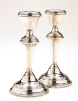 Lot 597 - A pair of Elizabeth II candlesticks, by W.I....