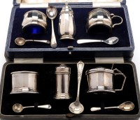 Lot 599 - A George VI three-piece condiment set, by...