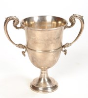 Lot 607 - A George V two-handled cup, by Reid & Sons,...