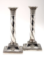 Lot 645 - A pair of Victorian candlesticks, by Hamilton...