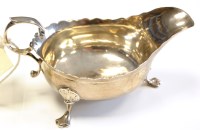 Lot 655 - A George II sauce boat, maker's mark rubbed,...