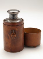 Lot 662 - A Victorian glass and leather covered flask...