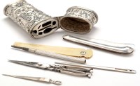 Lot 683 - A silver etui, of oval tapering form,...