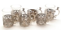 Lot 685 - A set of six Edwardian silver tot cups, by...