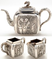 Lot 716 - A Chinese Export silver four-piece tea set, by...
