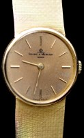 Lot 730 - Baume & Mercier, Geneva: an 18ct. yellow gold...