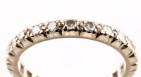 Lot 802 - A diamond eternity ring, set with...