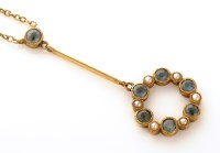 Lot 832 - An Edwardian aquamarine and seed pearl pendant,...