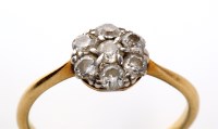 Lot 835 - A diamond cluster ring, the seven old cut...