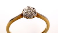 Lot 836 - A diamond cluster ring, the seven eight-cut...