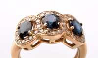 Lot 838 - A sapphire and diamond triple cluster ring,...