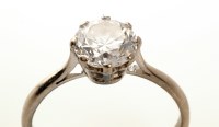Lot 844 - A brilliant cut solitaire diamond ring, in...