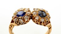 Lot 846 - A sapphire and diamond double cluster ring,...