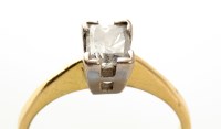 Lot 865 - A single stone diamond ring, the rectangular...