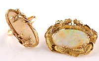 Lot 882 - An opal and yellow metal Chinese style brooch...