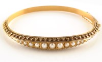 Lot 890 - An Etruscan style cultured pearl and yellow...