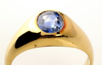 Lot 911 - A tanzanite ring, the oval facet cut tanzanite...