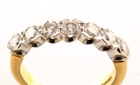 Lot 920 - A seven stone diamond ring, set with seven...