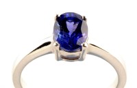 Lot 942 - A single stone tanzanite ring, the oval facet...