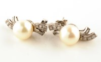 Lot 947 - A pair of cultured pearl and diamond earrings,...