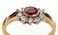 Lot 963 - A red-stone and diamond half cluster ring, the...