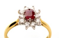 Lot 966 - A red-stone and diamond cluster ring, the...