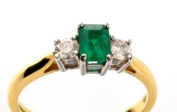 Lot 967 - An emerald and diamond ring, the central...