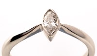 Lot 968 - A single stone diamond ring, the marquise cut...