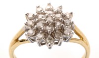 Lot 973 - A diamond cluster ring, the brilliant cut...