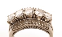 Lot 986 - A diamond ring, centred by five brilliant cut...