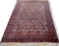 Lot 1231 - A Persian Afshar rug, the field full with...